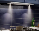 36 inch insert range hood illuminating the cooking surface