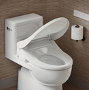KOHLER PureWash E875 elongated heated bidet toilet seat with remote control in white bathroom setting