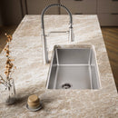 KOHLER stainless steel kitchen sink with pull-down faucet