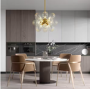 Y'INSP Aureli Sphere 18-Light Antique Brass Cluster Chandelier with Clear Sputnik Swirled Bubble Glass Shades for Dining Room