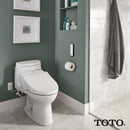 TOTO A200 electronic bidet toilet seat installed in a modern bathroom