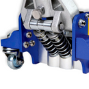 Close-up view of hydraulic floor jack piston, spring, and metal lifting mechanism components